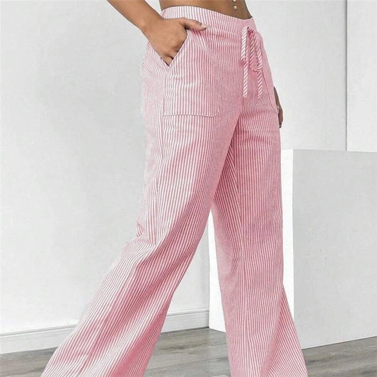 Striped Drawstring Wide-Leg Pants offer a perfect blend of comfort and style. These pants are designed for effortless wear. Featuring an elastic waistband with a drawstring.