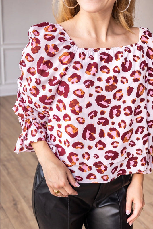  Off-Shoulder Leopard Print Top is a stylish blend of boldness and elegance. Featuring an eye-catching leopard print design.