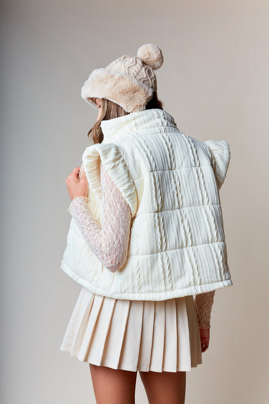  Quilted High-Collar Vest is the ultimate blend of warmth, comfort, and style. Crafted from cozy cable-quilted fabric.