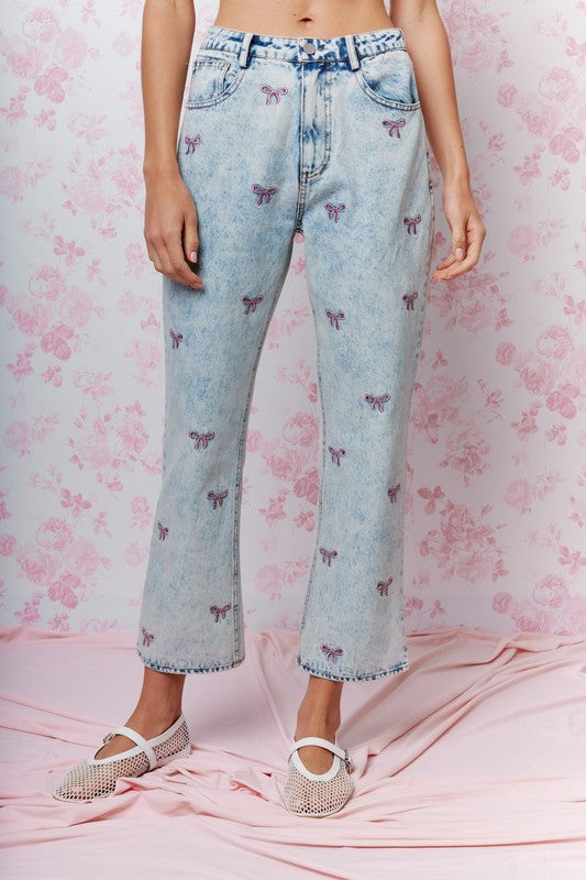 Embroidered Cropped Denim Jeans bring a playful twist to classic denim. Featuring a cropped length and all-over embroidered bow detail.