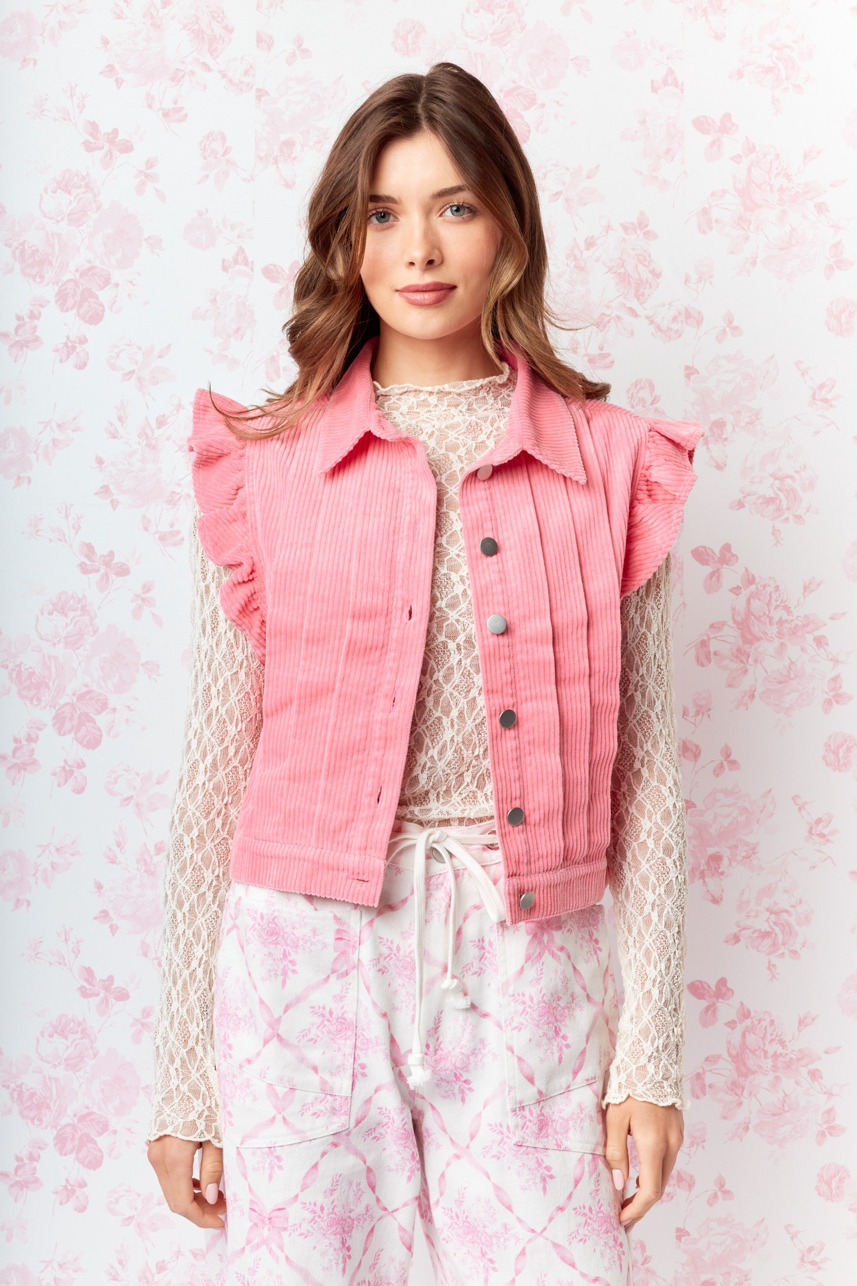 Pink Ruffled Corduroy Vest combines vintage charm with a modern twist. Crafted from soft washed corduroy fabric.