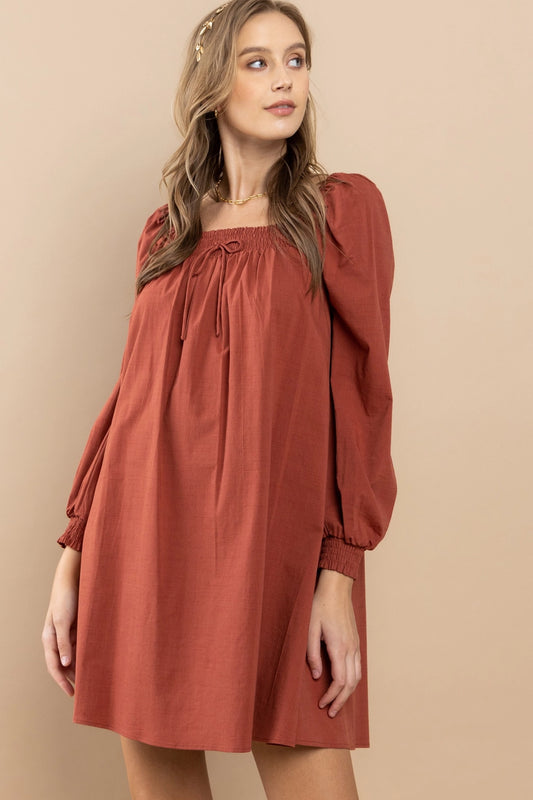 Rust Smocked Shoulder Dress Featuring smocking details on the shoulders.