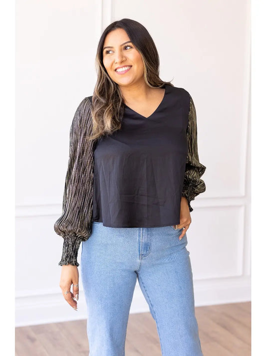 Balloon Sleeve Top is a sophisticated choice for any occasion. Designed with a relaxed fit and dramatic balloon sleeves.