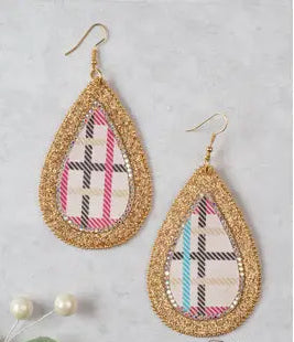 Teardrop-shaped earrings with plaid pattern and gold glitter frame on a light gray background.