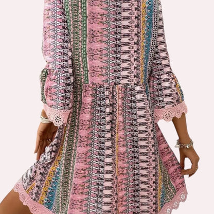 Pink Boho Lace Trim Mini Dress is a vibrant and breezy piece that captures effortless bohemian charm. Featuring a deep V-neckline and 3/4-length bell sleeves.