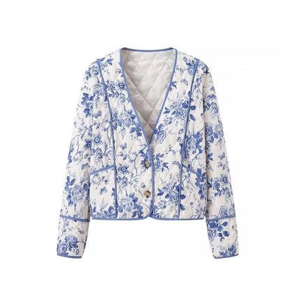 Blue  Floral Quilted Jacket is a timeless and elegant piece that offers both style and comfort. Featuring a classic blue-and-white floral pattern, this lightweight quilted jacket is perfect for layering during cooler seasons. 