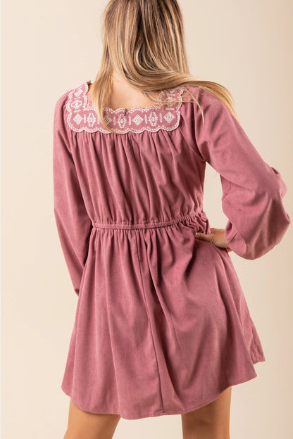 Embroidered Corduroy Mini Dress is a perfect blend of vintage charm and modern elegance.