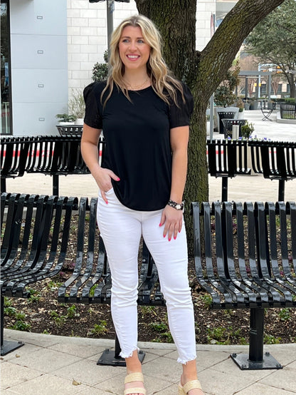 Eyelet Puff Sleeve Top is a chic and versatile wardrobe essential. Featuring elegant eyelet puff sleeves and a flattering silhouette.