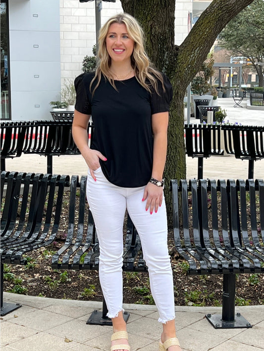 Eyelet Puff Sleeve Top is a chic and versatile wardrobe essential. Featuring elegant eyelet puff sleeves and a flattering silhouette.