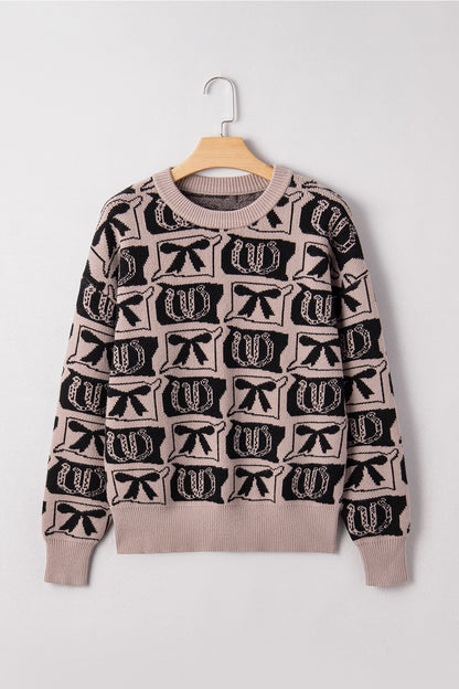 Western Print Sweater makes a bold statement with its unique bows and horseshoes pattern.