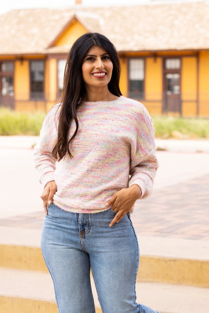 A multicolor Knit Top adds a vibrant, playful touch to your wardrobe. Crafted from a soft and stretchy blend, this top offers all-day comfort. Featuring a relaxed fit and a beautiful heathered multicolor knit design.