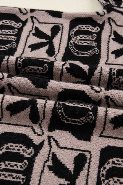 Western Print Sweater makes a bold statement with its unique bows and horseshoes pattern.