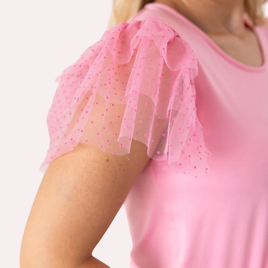 Pink Ruffle Sleeve Top is a fun and feminine piece that adds a playful touch to any outfit. Featuring delicate polka-dot mesh ruffle sleeves and a soft, lightweight fabric.