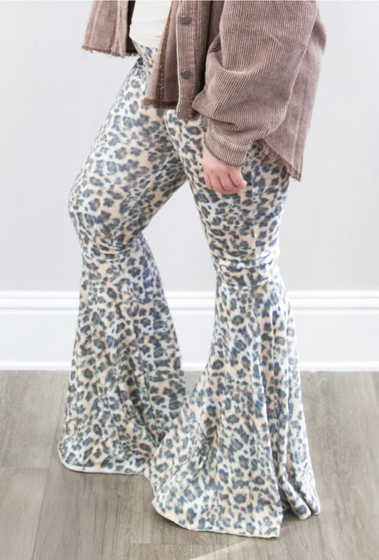  Leopard Print Flare Pants are a bold and stylish statement piece that combines comfort with flair.