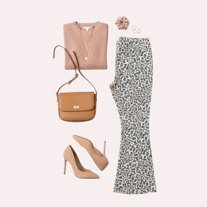 Fashionable outfit with pink top, leopard print pants, brown handbag, and beige heels on a white background