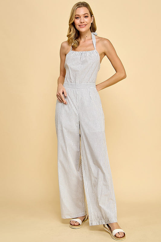 Striped Halter Jumpsuit is a chic and breezy one-piece outfit perfect for warm-weather occasions. Featuring a flattering waistband and a tie-back halter neckline.