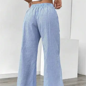 Striped Drawstring Wide-Leg Pants offer a perfect blend of comfort and style. These pants are designed for effortless wear. Featuring an elastic waistband with a drawstring.