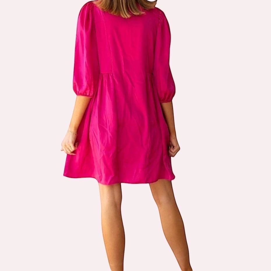 Hot Pink Satin Babydoll Dress is the perfect combination of elegance and playful charm. Featuring a shiny satin finish, this dress boasts a flattering babydoll silhouette.