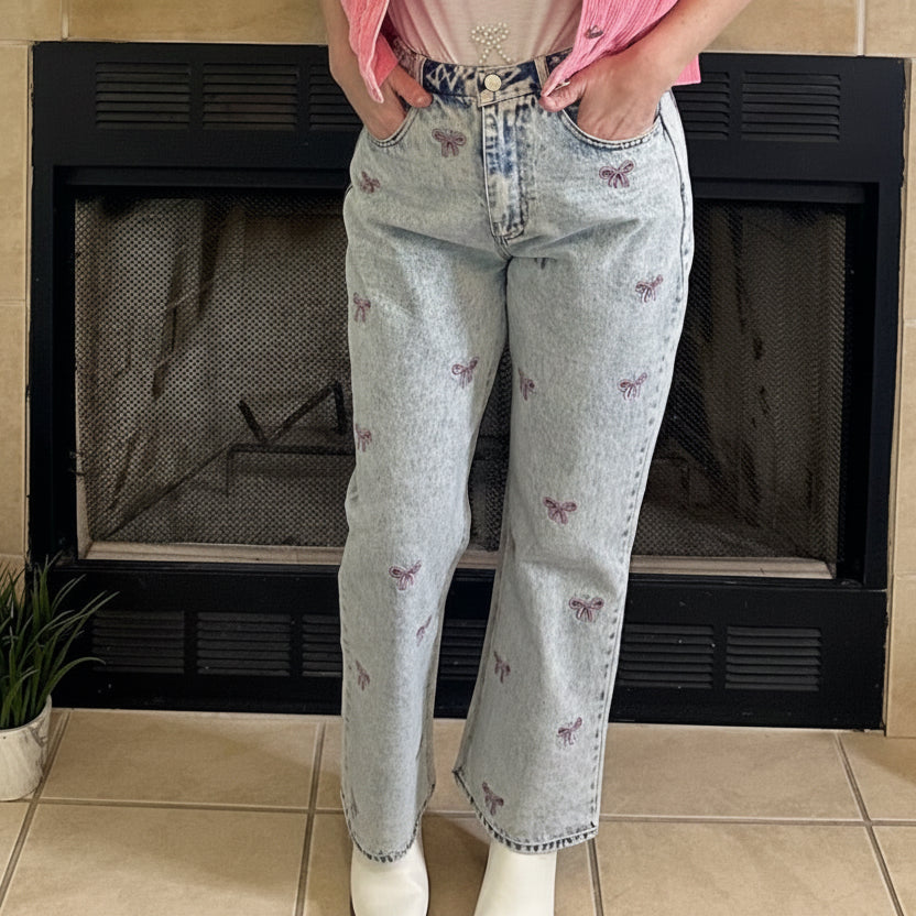 Embroidered Cropped Denim Jeans bring a playful twist to classic denim. Featuring a cropped length and all-over embroidered bow detail.