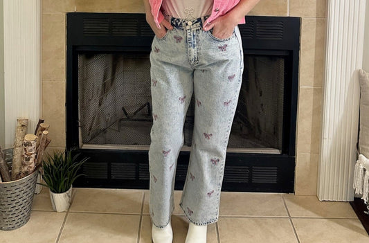 Embroidered Cropped Denim Jeans bring a playful twist to classic denim. Featuring a cropped length and all-over embroidered bow detail.