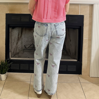 Embroidered Cropped Denim Jeans bring a playful twist to classic denim. Featuring a cropped length and all-over embroidered bow detail.