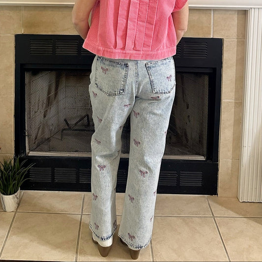 Embroidered Cropped Denim Jeans bring a playful twist to classic denim. Featuring a cropped length and all-over embroidered bow detail.