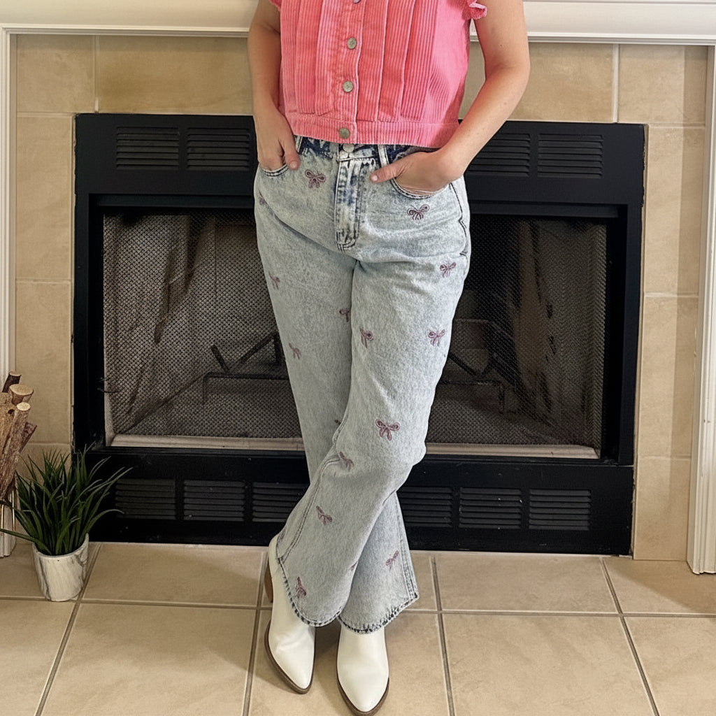 Embroidered Cropped Denim Jeans bring a playful twist to classic denim. Featuring a cropped length and all-over embroidered bow detail.