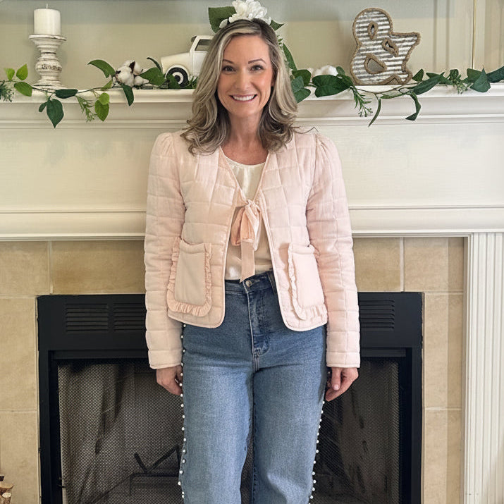 Reversible Quilted Jacket is a versatile and stylish layering piece that combines comfort with timeless charm. Crafted from voile fabric, this jacket features a quilted, patchwork print design and a flattering V-neckline. 