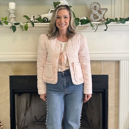 Reversible Quilted Jacket is a versatile and stylish layering piece that combines comfort with timeless charm. Crafted from voile fabric, this jacket features a quilted, patchwork print design and a flattering V-neckline. 