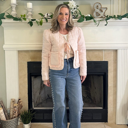 Reversible Quilted Jacket is a versatile and stylish layering piece that combines comfort with timeless charm. Crafted from voile fabric, this jacket features a quilted, patchwork print design and a flattering V-neckline. 
