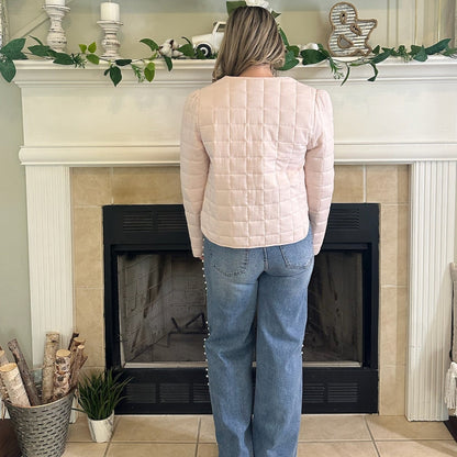 Reversible Quilted Jacket is a versatile and stylish layering piece that combines comfort with timeless charm. Crafted from voile fabric, this jacket features a quilted, patchwork print design and a flattering V-neckline. 