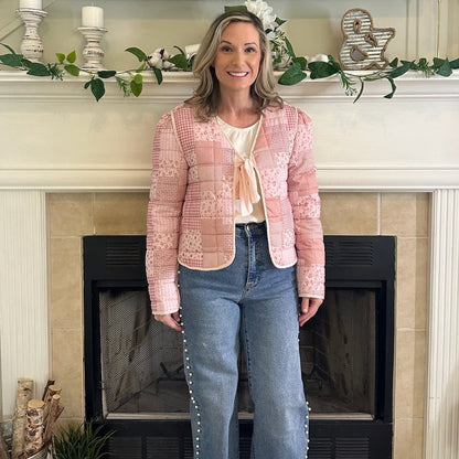 Reversible Quilted Jacket is a versatile and stylish layering piece that combines comfort with timeless charm. Crafted from voile fabric, this jacket features a quilted, patchwork print design and a flattering V-neckline. 