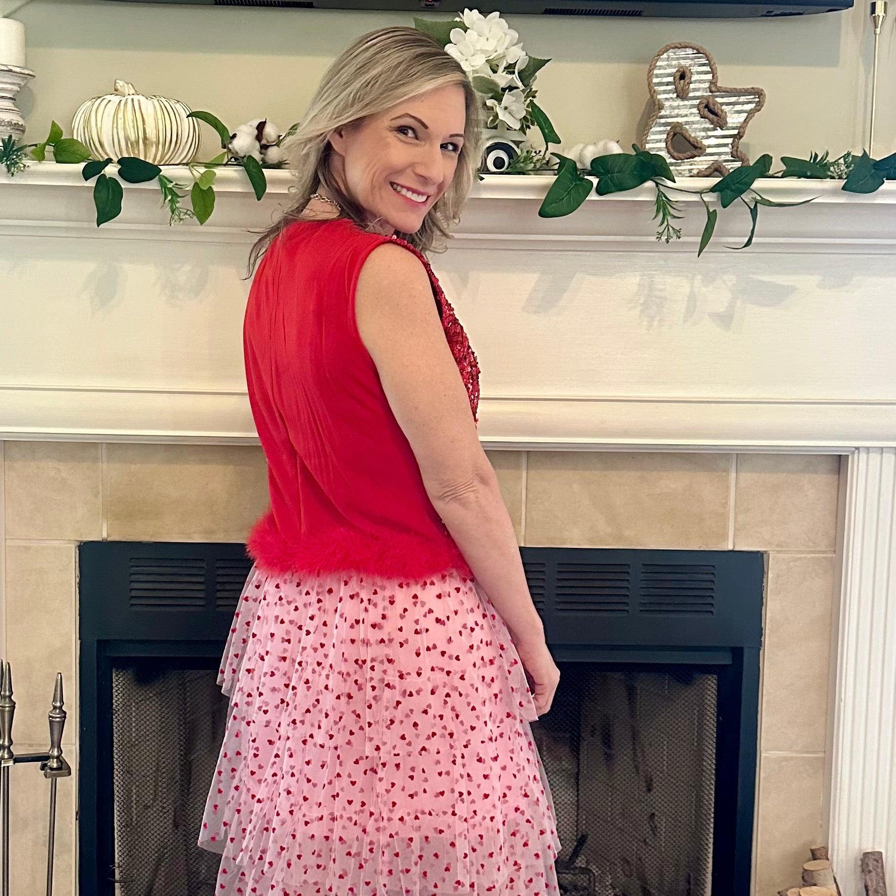 Heart Tiered Tulle Skirt is a whimsical and romantic piece perfect for adding a playful touch to your wardrobe. Featuring multiple layers of soft tulle adorned with delicate heart patterns.