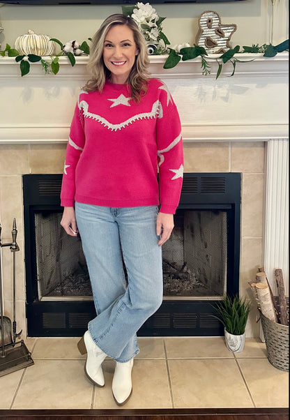  Star-Accent Sweater is a fun and vibrant addition to your wardrobe. Designed with a relaxed fit, this bold pink sweater features playful star and wave patterns in contrasting colors.