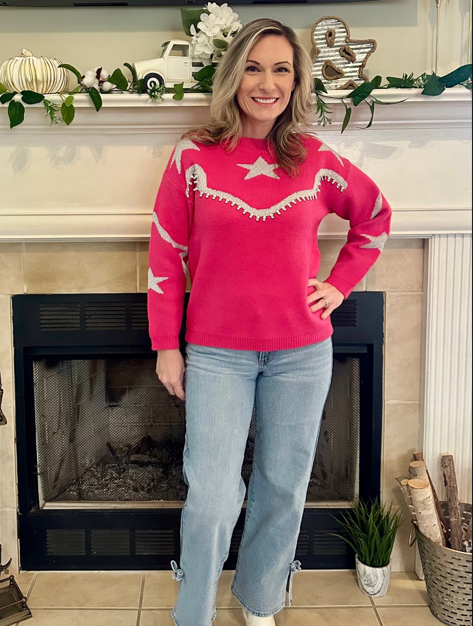  Star-Accent Sweater is a fun and vibrant addition to your wardrobe. Designed with a relaxed fit, this bold pink sweater features playful star and wave patterns in contrasting colors.