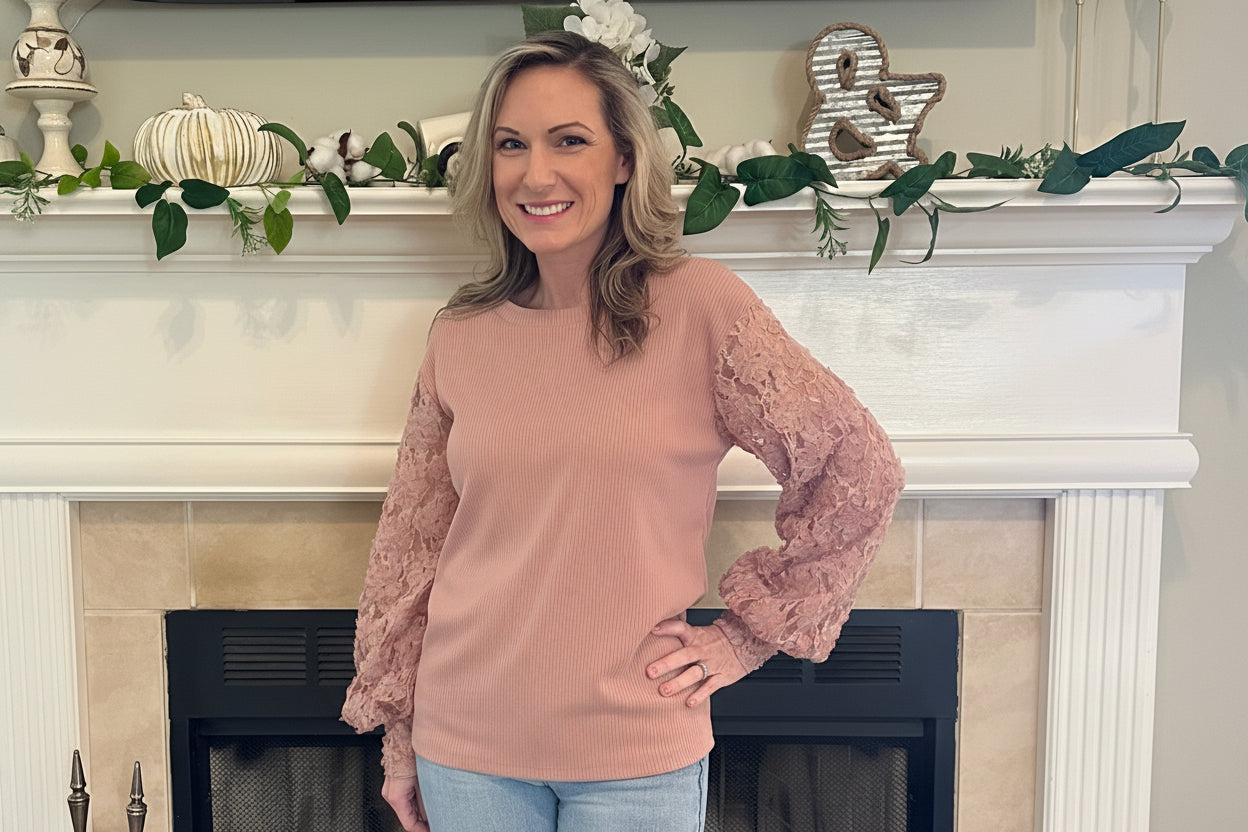 Mauve Lace Sleeve Top combines timeless elegance with modern charm. Featuring intricate lace sleeves and a classic crew neckline.
