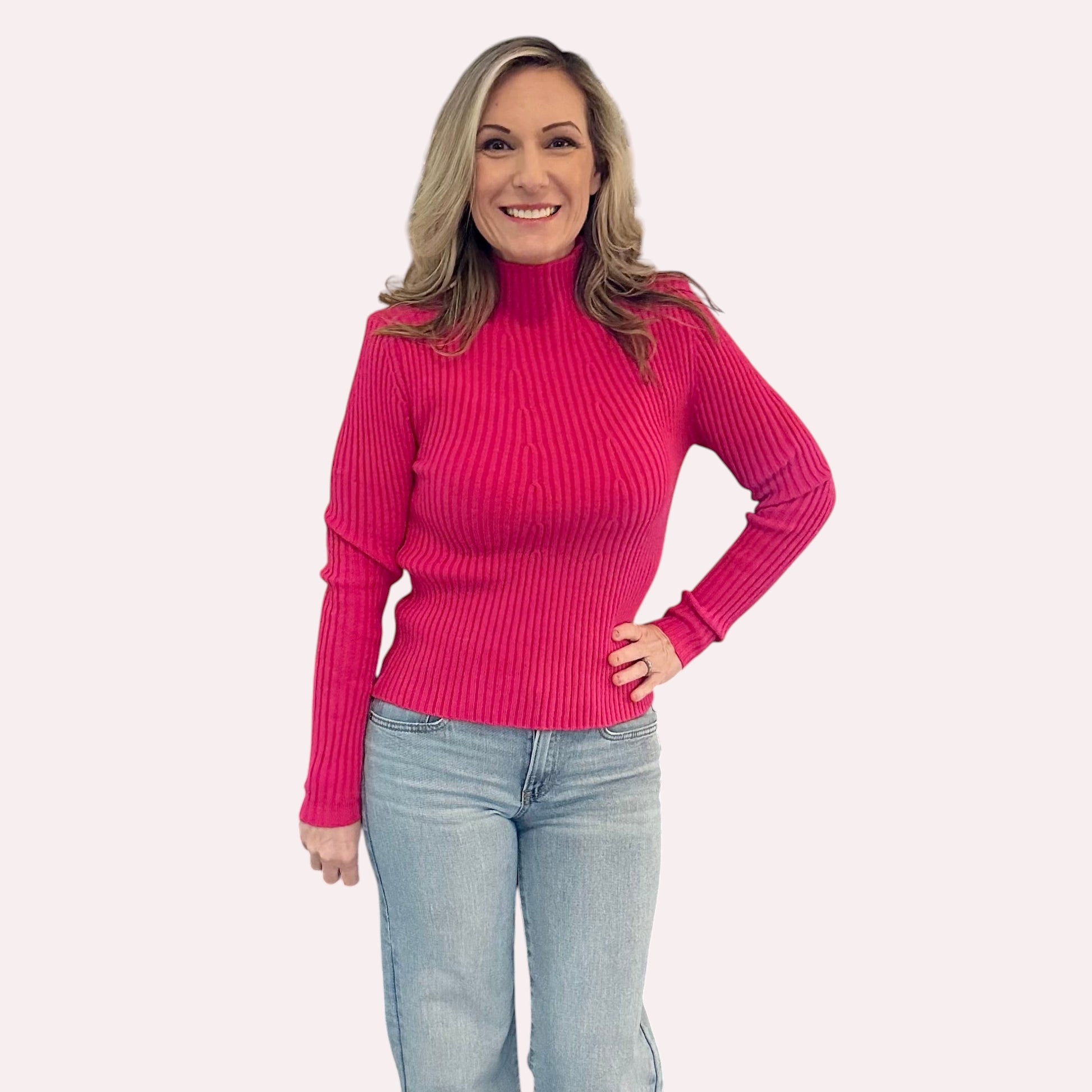 Hot Pink Ribbed Turtleneck Sweater is a chic and versatile addition to your wardrobe. Designed with a fitted silhouette.