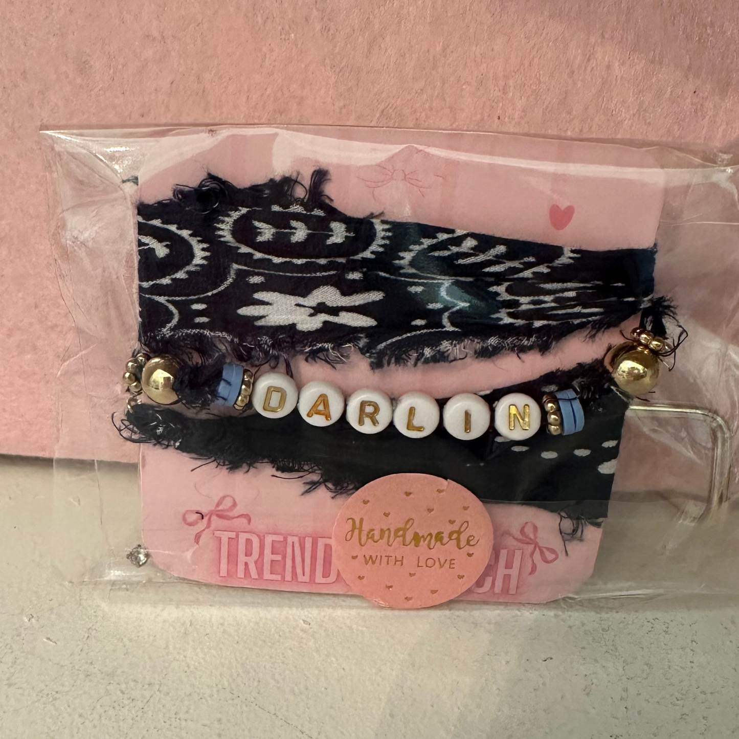 Handmade bandana bracelet with beaded word Darlin. 