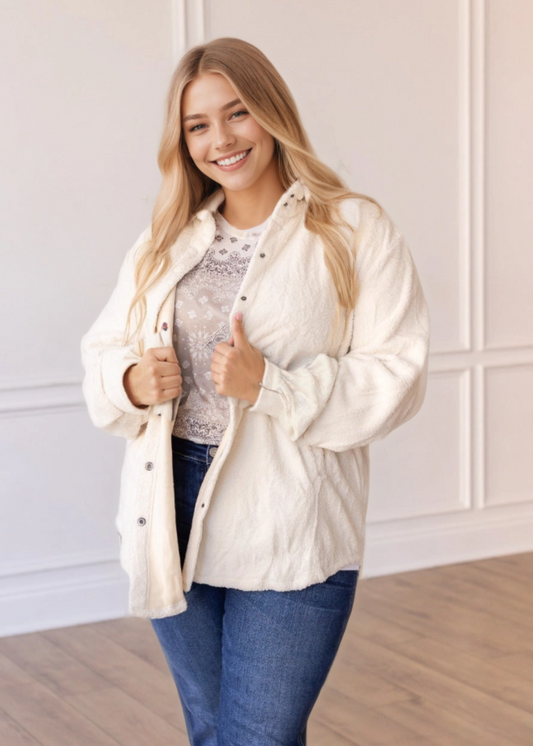 Cream Colored  Oversized Sherpa Button-Up Jacket is the ultimate cozy companion for chilly days. Featuring an oversized fit and soft sherpa fabric.