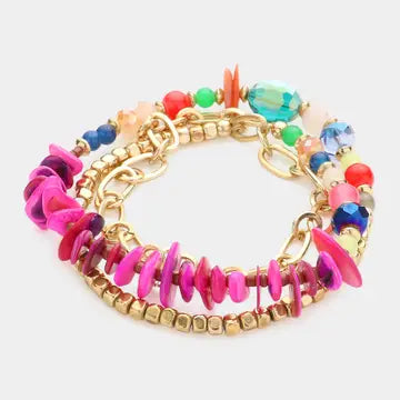 Colorful beaded bracelet with gold chain on a white background