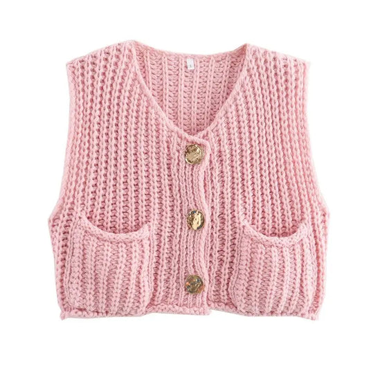  Knit Button-Front Vest is a cozy and stylish layering piece, perfect for adding texture to your outfit. 
