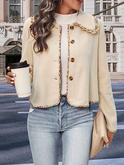 Buttoned Lapel Jacket is a stylish and versatile piece designed for a polished yet relaxed look. this jacket features a loose fit and long sleeves for effortless comfort. 