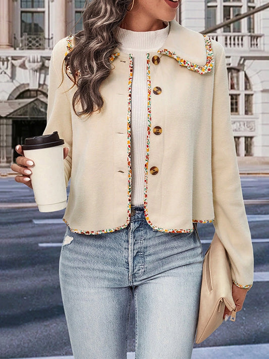  Buttoned Lapel Jacket is a stylish and versatile piece designed for a polished yet relaxed look. this jacket features a loose fit and long sleeves for effortless comfort. 