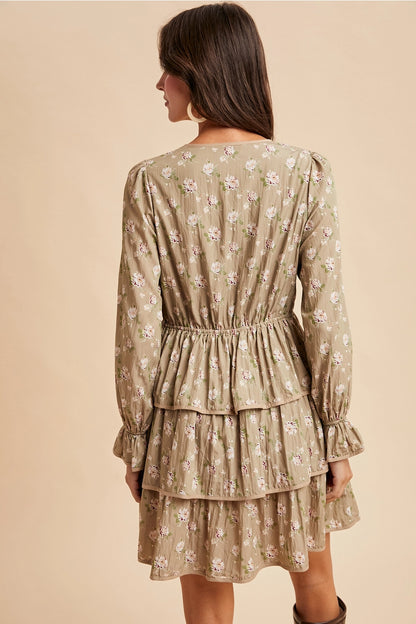  Bow Tie Floral Dress is a playful and feminine piece that combines charm and sophistication. 