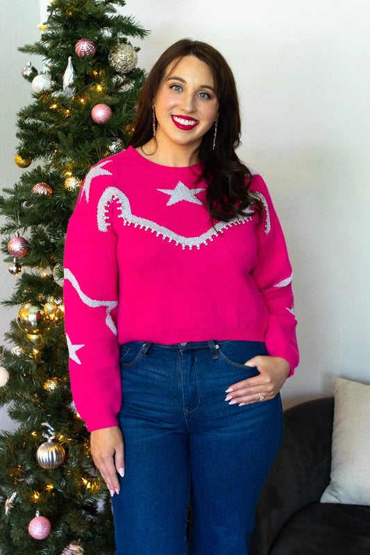  Star-Accent Sweater is a fun and vibrant addition to your wardrobe. Designed with a relaxed fit, this bold pink sweater features playful star and wave patterns in contrasting colors.