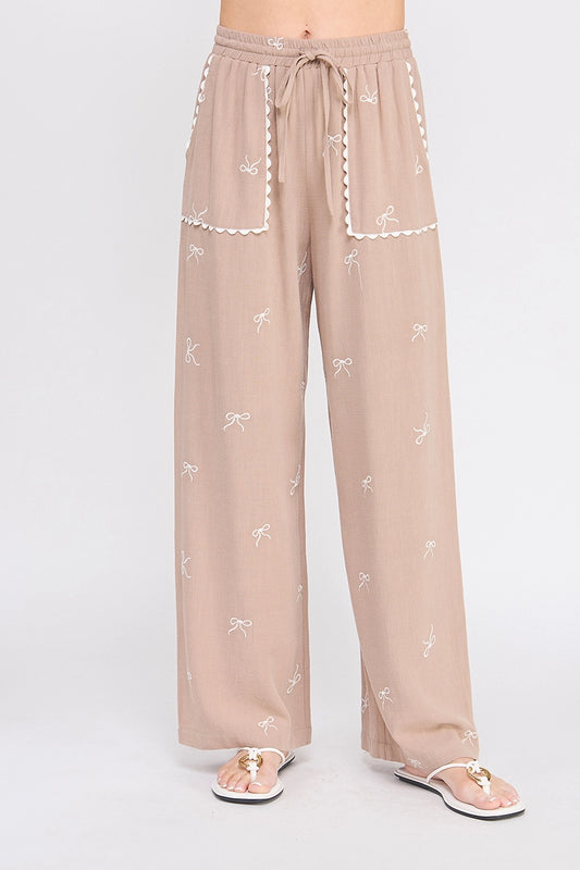 Beige Bow Embroidered Palazzo Pants.