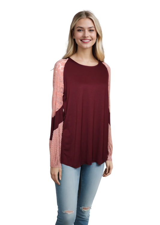 Blouse with pink lace balloon sleeves and burgandy body. 