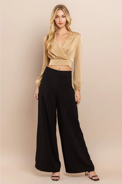 Beige Wrap Crop Top Made from lightweight polyester, this top features a flattering wrap design with a deep V-neckline and long sleeves.