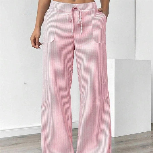 Striped Drawstring Wide-Leg Pants offer a perfect blend of comfort and style. These pants are designed for effortless wear. Featuring an elastic waistband with a drawstring.