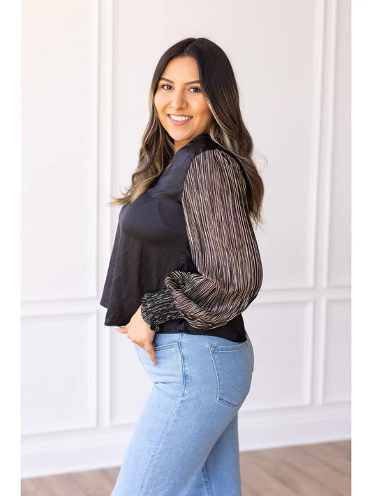 Balloon Sleeve Top is a sophisticated choice for any occasion. Designed with a relaxed fit and dramatic balloon sleeves.